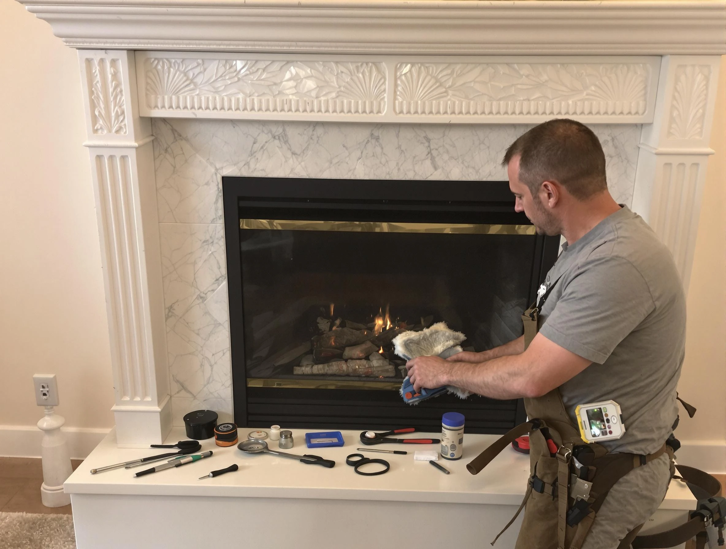 South Jordan Chimney Sweep performing fireplace maintenance in South Jordan, UT